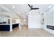Bright living area boasting an open layout, stylish ceiling fan, and modern fixtures for comfortable living at 217 W Bay St, Winter Garden, FL 34787