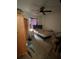 Bedroom with a ceiling fan and natural light from the window at 225 Ronnie Cir, Orlando, FL 32811
