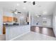 Modern kitchen with bar counter, stainless steel appliances, and light cabinets at 2401 8Th St, St Cloud, FL 34769