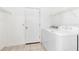Laundry room with washer and dryer and closet for storage at 2401 8Th St, St Cloud, FL 34769