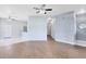 Open-concept living room with a view of the kitchen and hallway at 2401 8Th St, St Cloud, FL 34769