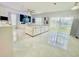 Spacious living room with abundant natural light and comfortable seating, creating a welcoming atmosphere at 247 Whispering Pines Way, Davenport, FL 33837