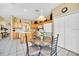 Bright eat-in kitchen with stainless steel appliances and tiled floors at 2632 Emerald Island Blvd, Kissimmee, FL 34747