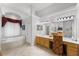 This bathroom features a tub, shower, and vanity with a makeup area at 2746 Kissimmee Bay Cir, Kissimmee, FL 34744