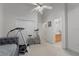 Bedroom includes ceiling fan and exercise equipment at 2746 Kissimmee Bay Cir, Kissimmee, FL 34744