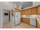 Spacious kitchen features stainless steel appliances and ample cabinet space and refrigerator at 2746 Kissimmee Bay Cir, Kissimmee, FL 34744