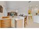 Charming kitchen with bar and wet bar, offering a great space for entertaining at 2746 Kissimmee Bay Cir, Kissimmee, FL 34744