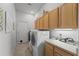 Laundry room with plenty of storage and counter space at 2746 Kissimmee Bay Cir, Kissimmee, FL 34744