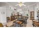 Spacious living room with decorative shelving, neutral colors, and comfortable seating at 2746 Kissimmee Bay Cir, Kissimmee, FL 34744