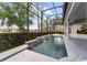 Beautiful view of the private in-ground pool and screened-in pool area at 2746 Kissimmee Bay Cir, Kissimmee, FL 34744
