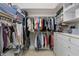 This walk-in closet is spacious with custom shelving for organization at 2746 Kissimmee Bay Cir, Kissimmee, FL 34744