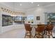 Cozy wet bar featuring counter seating and a window view to the pool at 2746 Kissimmee Bay Cir, Kissimmee, FL 34744