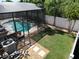 Aerial view of screened-in pool area and backyard. Great space for relaxing or enjoying the outdoors at 2888 Spring Breeze Way, Kissimmee, FL 34744