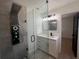Modern bathroom featuring a glass shower enclosure, updated vanity, and contemporary fixtures at 3045 Plaza Terrace Dr, Orlando, FL 32803