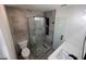 Updated bathroom showcasing a shower with rainfall shower head, custom shower niche, and modern vanity at 3045 Plaza Terrace Dr, Orlando, FL 32803