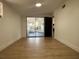 Bedroom showing flooring and a screened-in back porch at 3045 Plaza Terrace Dr, Orlando, FL 32803