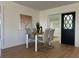 Elegant dining area features a modern table set and contemporary decor, perfect for Gathering meals at 3045 Plaza Terrace Dr, Orlando, FL 32803