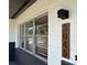 Exterior shot of the front of the house with the address displayed at 3045 Plaza Terrace Dr, Orlando, FL 32803