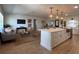 Spacious open floorplan seamlessly connects the living room and kitchen, perfect for entertaining at 3045 Plaza Terrace Dr, Orlando, FL 32803