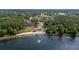 Aerial view of a neighborhood with beach and lake access at 3235 Candle Ridge Dr # 102, Orlando, FL 32822