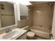 Bathroom featuring updated vanity with sink, toilet, and shower/tub combo at 3235 Candle Ridge Dr # 102, Orlando, FL 32822