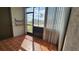 Enclosed sunroom featuring orange tiled floors, sunshades and offering lots of natural light at 3235 Candle Ridge Dr # 102, Orlando, FL 32822