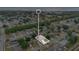 An overhead shot of a home and surrounding neighborhood on a bright day at 3886 Creek Bed Cir, St Cloud, FL 34769