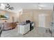 Open concept kitchen with sleek appliances, plenty of counter space, and a seamless flow to the living areas at 3886 Creek Bed Cir, St Cloud, FL 34769