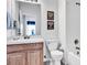 Bright bathroom featuring a modern vanity, toilet, and shower-tub, providing a clean and functional space at 4739 Cumbrian Lakes Dr, Kissimmee, FL 34746