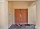 Inviting front entrance with a double door, creating a warm welcome into this home at 4739 Cumbrian Lakes Dr, Kissimmee, FL 34746