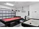 Spacious game room featuring a pool table, air hockey, and foosball at 4739 Cumbrian Lakes Dr, Kissimmee, FL 34746