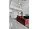 Spacious living room with high ceilings, tiled floors, and a view of the upper level balcony at 4739 Cumbrian Lakes Dr, Kissimmee, FL 34746