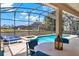 Screened-in pool with lounge chairs and a spa for relaxing outdoor living at 4739 Cumbrian Lakes Dr, Kissimmee, FL 34746