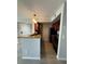 Modern kitchen with granite countertops, stainless steel appliances, and hardwood flooring at 5160 Conroy Rd # 26, Orlando, FL 32811