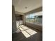 Laundry room features a washer, dryer, and natural light streaming through large windows at 5160 Conroy Rd # 26, Orlando, FL 32811
