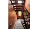 Interior stairwell with textured walls, sturdy railings, and natural light at 5160 Conroy Rd # 26, Orlando, FL 32811