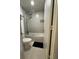 Clean bathroom featuring a shower-tub combo and modern fixtures at 5245 W Irlo Bronson Memorial Hwy # 276, Kissimmee, FL 34746