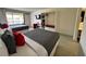 A bedroom featuring 2 beds, desk, and a cabinet with a microwave and minibar at 5245 W Irlo Bronson Memorial Hwy # 276, Kissimmee, FL 34746