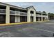 Motel exterior featuring balconies, a large parking area, and easy access to rooms at 5245 W Irlo Bronson Memorial Hwy # 276, Kissimmee, FL 34746