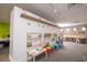 Playroom featuring desks, ' books, a small kitchen and toys at 5245 W Irlo Bronson Memorial Hwy # 276, Kissimmee, FL 34746