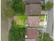 Aerial view of property lines in neighborhood with mature tree coverage at 5321 Los Palma Vista Dr, Orlando, FL 32837