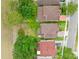 Aerial view of neighborhood showcasing rooftops and tree coverage at 5321 Los Palma Vista Dr, Orlando, FL 32837