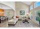 Bright living room featuring tile floors, neutral colors, and plenty of natural light at 5321 Los Palma Vista Dr, Orlando, FL 32837