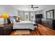 Large main bedroom with stylish decor and hardwood floors, offering a serene retreat at 5321 Los Palma Vista Dr, Orlando, FL 32837