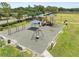 Well-equipped playground with swings, slides, and ample seating at 5321 Los Palma Vista Dr, Orlando, FL 32837