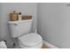 Toilet with decorative baskets on the tank at 5321 Los Palma Vista Dr, Orlando, FL 32837