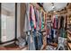 Spacious walk-in closet with custom shelving and storage solutions at 5321 Los Palma Vista Dr, Orlando, FL 32837