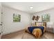 A cozy bedroom with two windows for natural light and stylish decor at 620 Plum Ln, Altamonte Springs, FL 32701