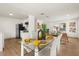 Bright dining area featuring stylish table seating, and open access to the kitchen and living room at 620 Plum Ln, Altamonte Springs, FL 32701