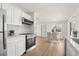 Bright, updated kitchen with stainless steel appliances and an adjacent dining area with natural light at 620 Plum Ln, Altamonte Springs, FL 32701